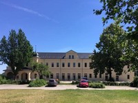 Exterior view of the manor house after renovation