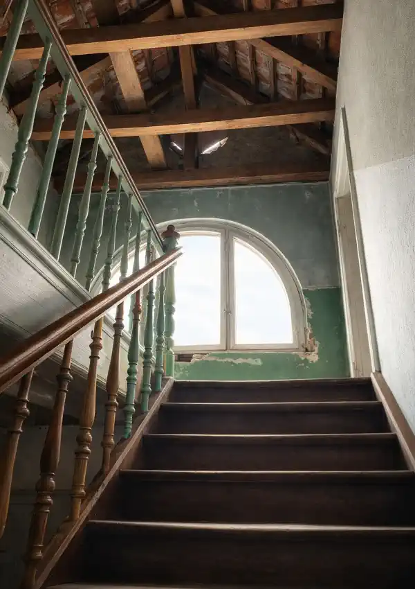 Staircase of the villa with a large creaking wooden staircase