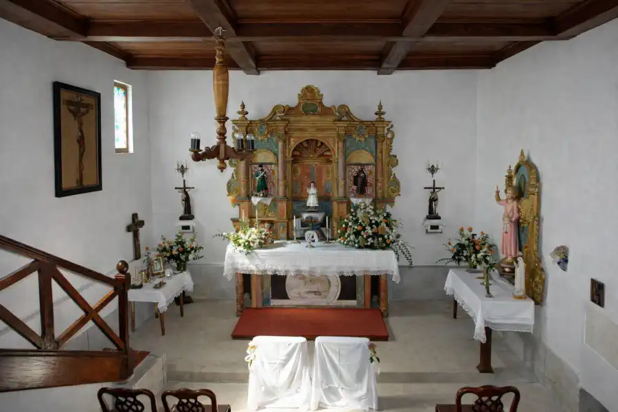 The private chapel of Pazo de Ferreiroá with its traditional granite altar and historic religious features.
