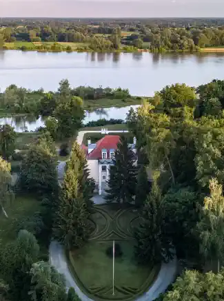 Manor on the Vistula escarpment with park and river View