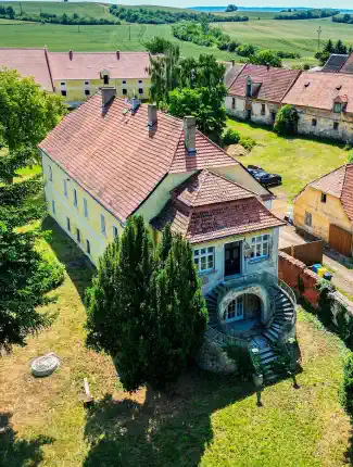 Late baroque castle with farm complex in Milčeves, Northwest Bohemia, Žatec, Ústí nad Labem Region